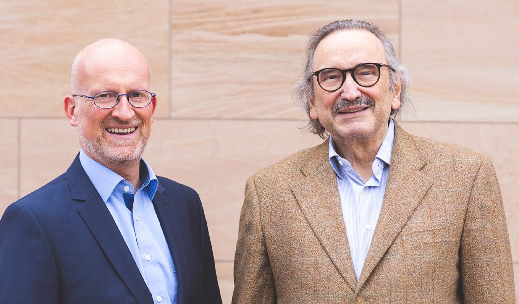 Dr. Reimar Schlingensiepen (left), the newly appointed CEO of AudioCure Pharma GmbH, with Prof. Hans Rommelspacher Dr. Reimar Schlingensiepen (left), the newly appointed CEO of AudioCure Pharma GmbH, takes over from Prof. Hans Rommelspacher, founder of the company, who continues as CSO.